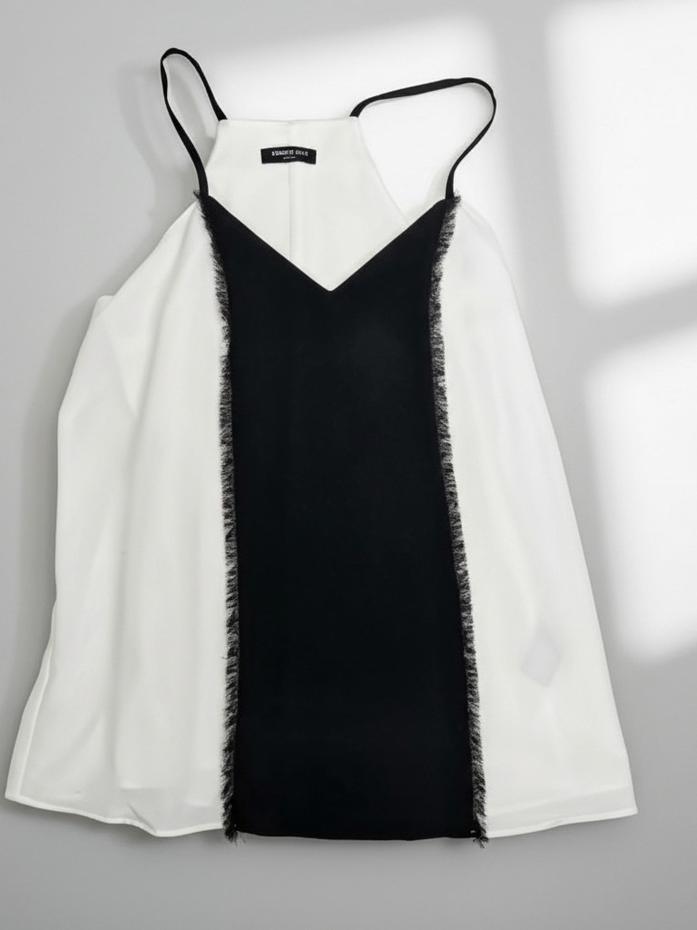 NWOT Kenneth Cole Ivory and Black Blouse Womens Size Small. Unique Fringe Design